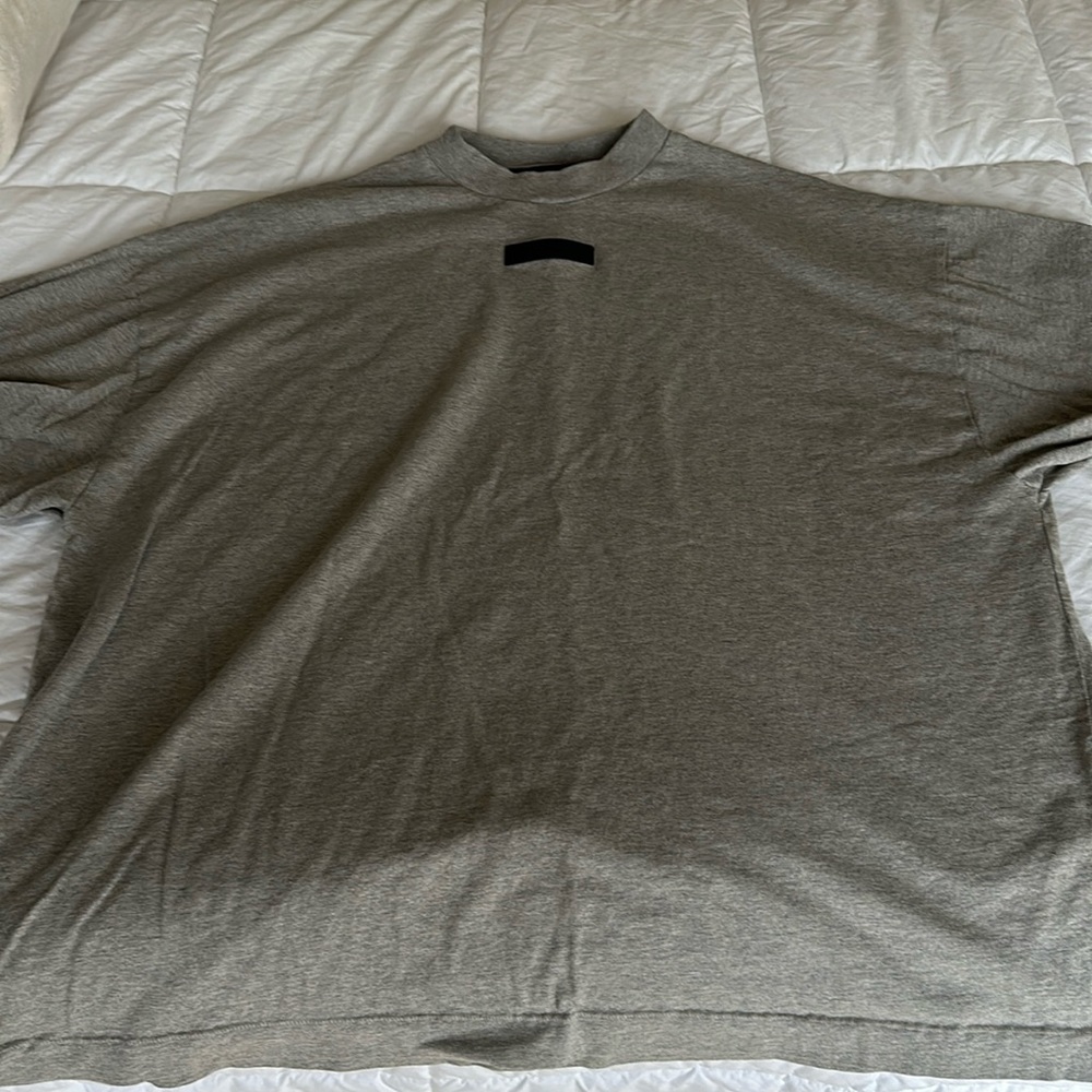 Fear of God Essentials Light Heather Grey T-Shirt.